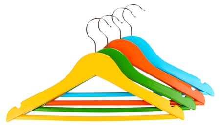 Colorful clothes hangers isolated on whiteの写真素材