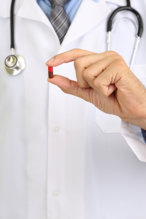 Medical doctor giving you a pillの写真素材