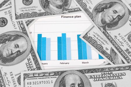 Business background. Financial data concept with diagram and moneyの写真素材