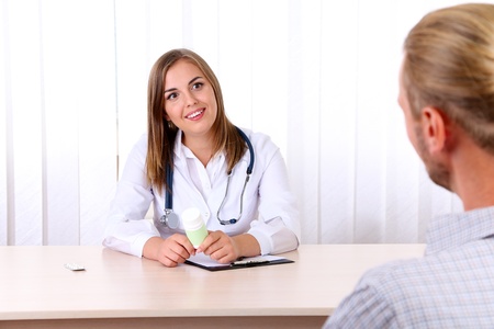 Doctor and patient at officeの写真素材