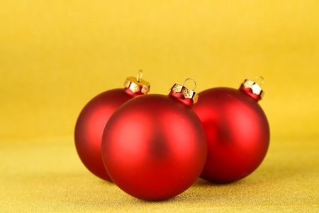 Christmas balls on yellow backgroundの写真素材
