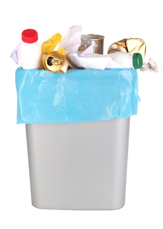 Bin full of rubbish isolated on whiteの写真素材
