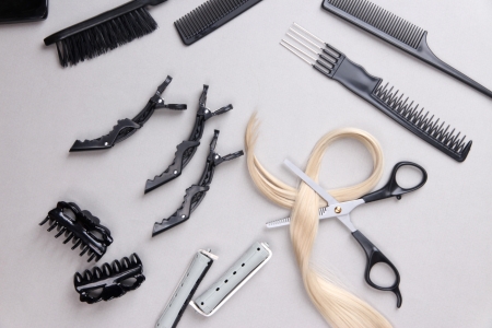 Professional hairdresser tools on gray backgroundの写真素材