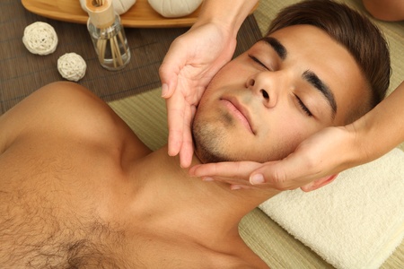 Man having head massage close upの写真素材
