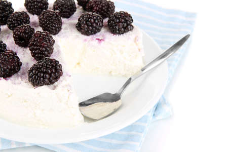 Cheesecake with fresh berries on white plate closeupの写真素材