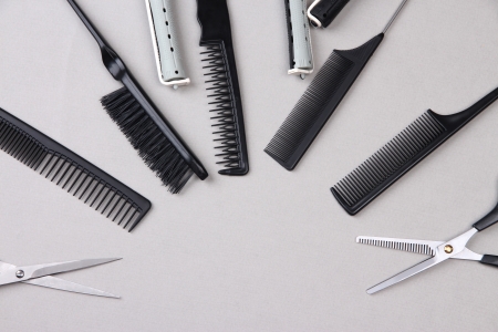 Professional hairdresser tools on gray backgroundの写真素材