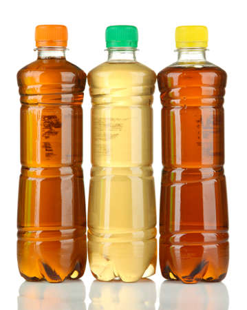 Bottles with tasty drinks, isolated on whiteの写真素材
