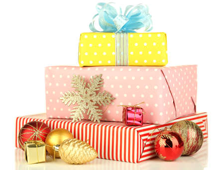 Gifts with christmas decorations, isolated on white