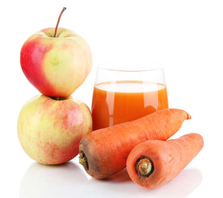 Sweet apples, juice and carrot isolated on whiteの写真素材