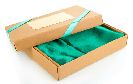 Present box tied with ribbon, isolated on whiteの写真素材