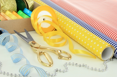 Materials and accessories for wrapping gifts isolated on whiteの写真素材