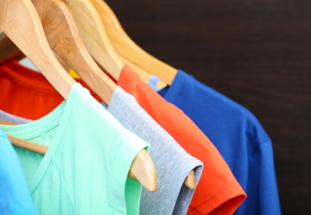 Clothes on circle hanger on dark backgroundの写真素材