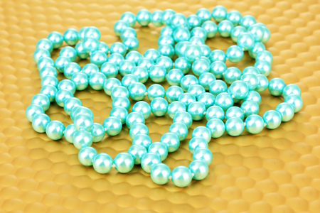 Color beads on bright background, close-up の写真素材