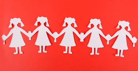 Paper people in social network concept on red backgroundの写真素材