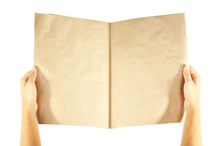 Newspaper in hands isolated on whiteの写真素材