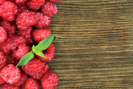 Fresh raspberry on wooden backgroundの写真素材