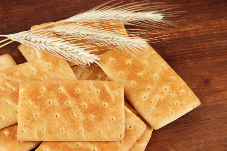 Delicious crackers with spikes on wooden の写真素材