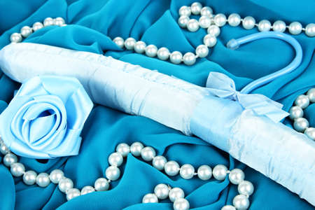 Beautiful hanger on fabric backgroundの写真素材