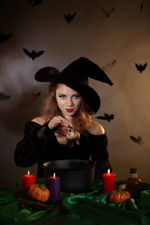 Halloween witch on dark backgroundの写真素材