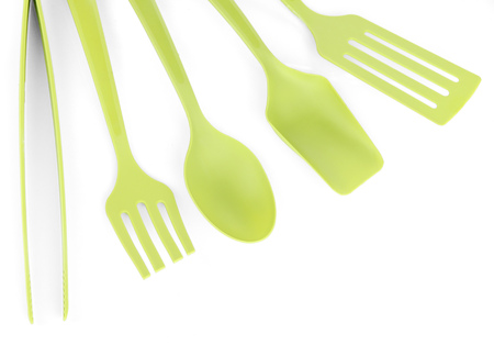 Plastic kitchen utensils isolated on whiteの写真素材