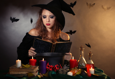 Halloween witch on dark backgroundの写真素材