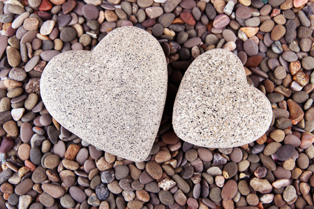 Two hearts on small sea stones, close upの写真素材