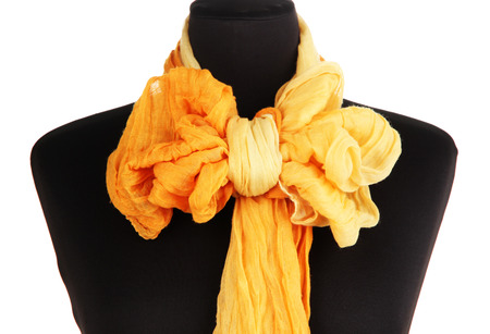 Mannequin wearing scarf isolated on whiteの写真素材