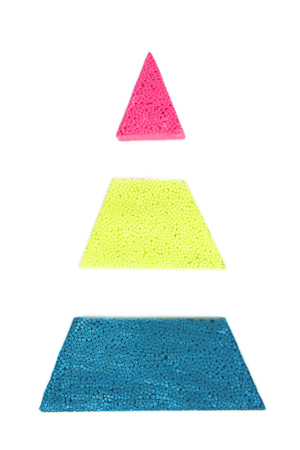 Building blocks in shape of triangle isolated on white