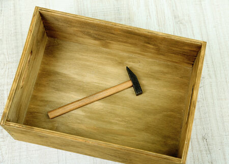 Instrument in wooden box, on color background
