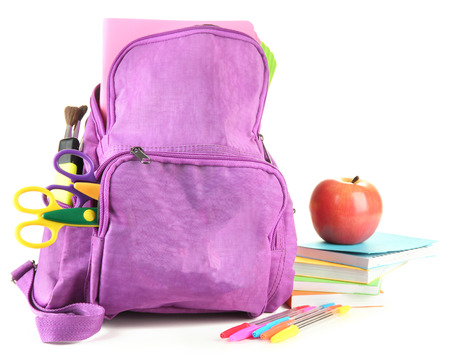 Purple backpack with school supplies isolated on white の写真素材