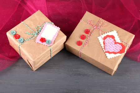 Paper gift boxes on wooden backgroundの写真素材