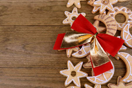 Delicious Christmas cookies on wooden background