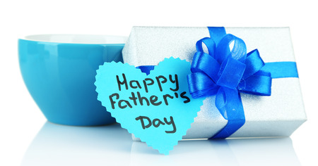 Happy Fathers Day tag with gift box and cup, isolated on whiteの写真素材