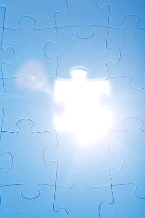 Last piece of jigsaw puzzle, close-upの写真素材