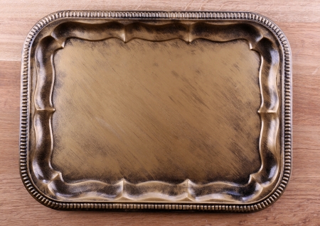 Vintage tray, on wooden backgroundの写真素材