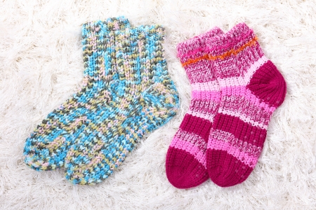 Woolen socks, on color backgroundの写真素材