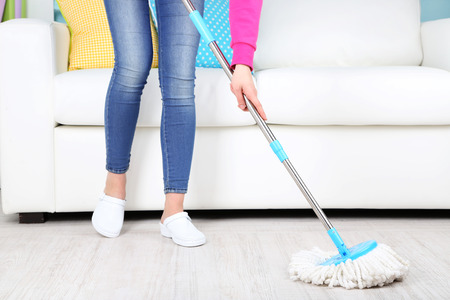 Cleaning floor in room close-upの写真素材