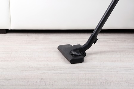 Vacuum cleaner to tidy up the living roomの写真素材