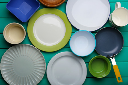 Different tableware on wooden backgroundの写真素材