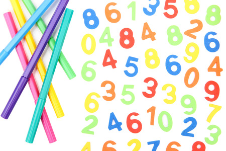 Colorful numbers and markers, isolated on white