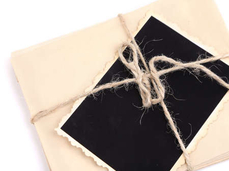 Blank old photo, letters isolated on whiteの写真素材