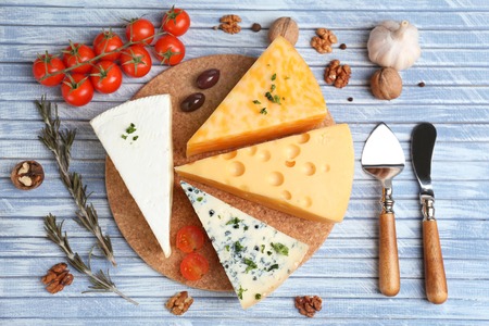 Different Italian cheese on wooden tableの写真素材
