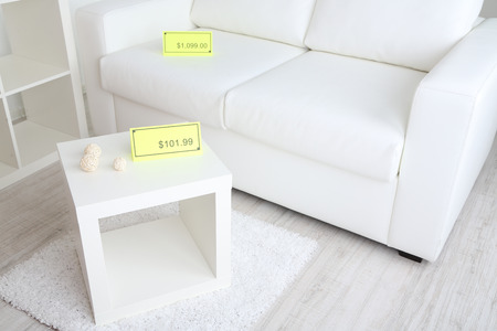 New white furniture with prices on light backgroundの写真素材