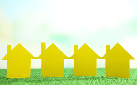 Houses on grass on natural backgroundの写真素材