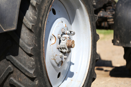 Big tractor wheel, close-upの写真素材