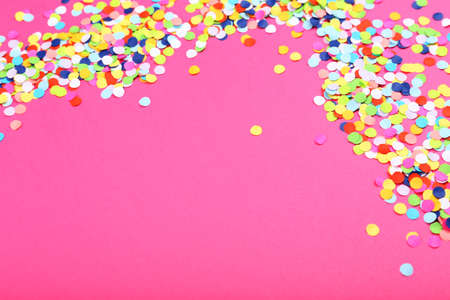 Confetti on pink backgroundの写真素材