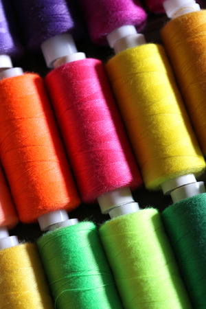 Multicolor sewing threads backgroundの写真素材