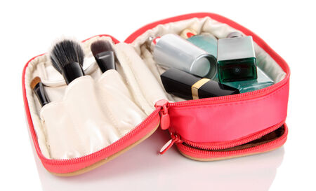 Full cosmetic bag isolated on whiteの写真素材