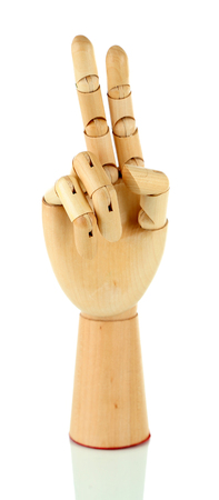 Wooden hand isolated on whiteの写真素材