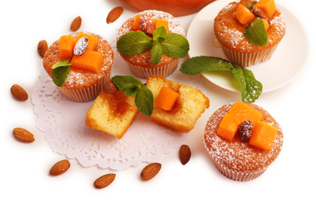 Tasty pumpkin muffins, isolated on whiteの写真素材